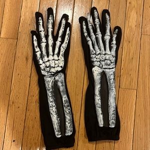 Halloween skeleton hands gloves.